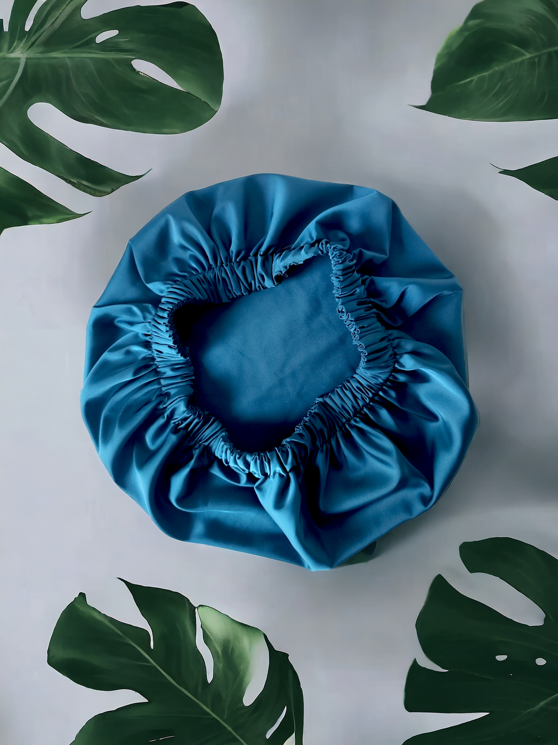 Bonetă din satin turquoise